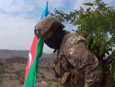 Armenia-Azerbaijan truce begins amid reports of new fighting