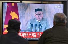Kim Jong-un praises troops for ‘stopping coronavirus’ at huge parade