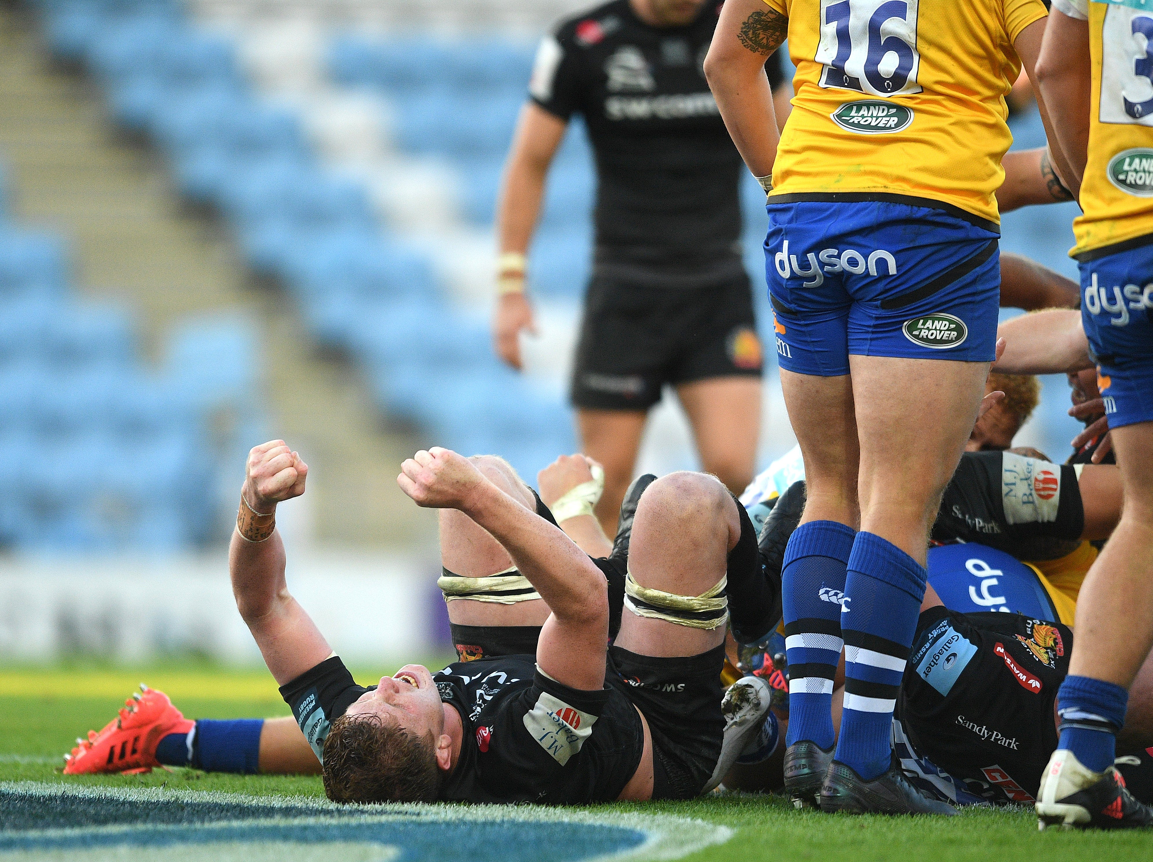 Jacques Vermeulen of Exeter Chiefs celebrates a try scored by team-mate Jonny Hill