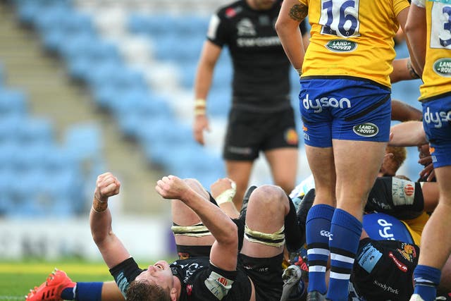 Jacques Vermeulen of Exeter Chiefs celebrates a try scored by team-mate Jonny Hill