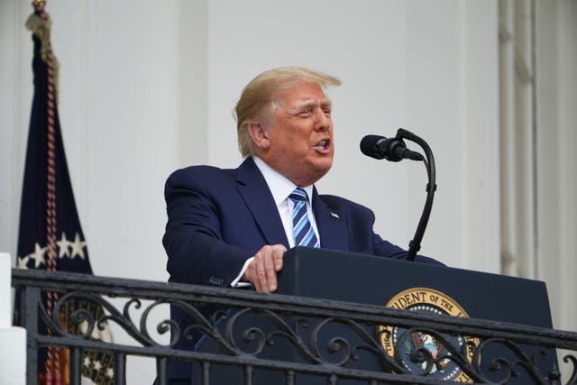 US President Donald Trump speaks about law and order from the South Portico of the White House in Washington, DC, on October 10, 2020. - Trump spoke publicly for the first time since testing positive for Covid-19, as he prepares a rapid return to the campaign trail just three weeks before the election. 