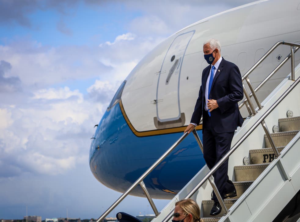 Mike Pence is pictured arriving in Orlando on Saturday for a series of rallies in the vital swing state 