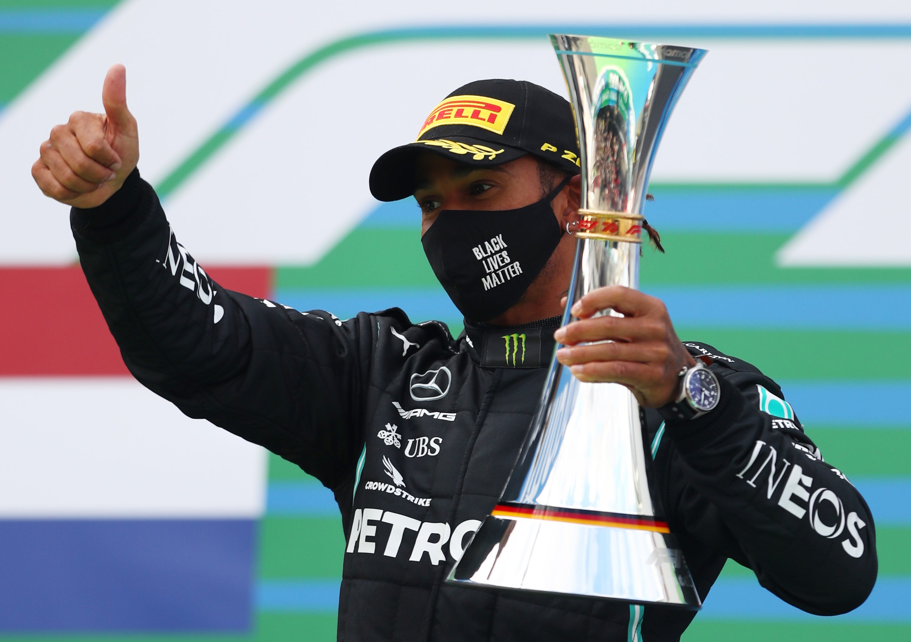 Lewis Hamilton celebrates winning the Eifel Grand Prix at the Nurburgring