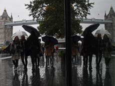 Flood warnings as rain sweeps across UK and temperatures drop