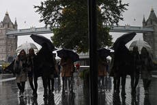 Flood warnings as rain sweeps across UK and temperatures drop