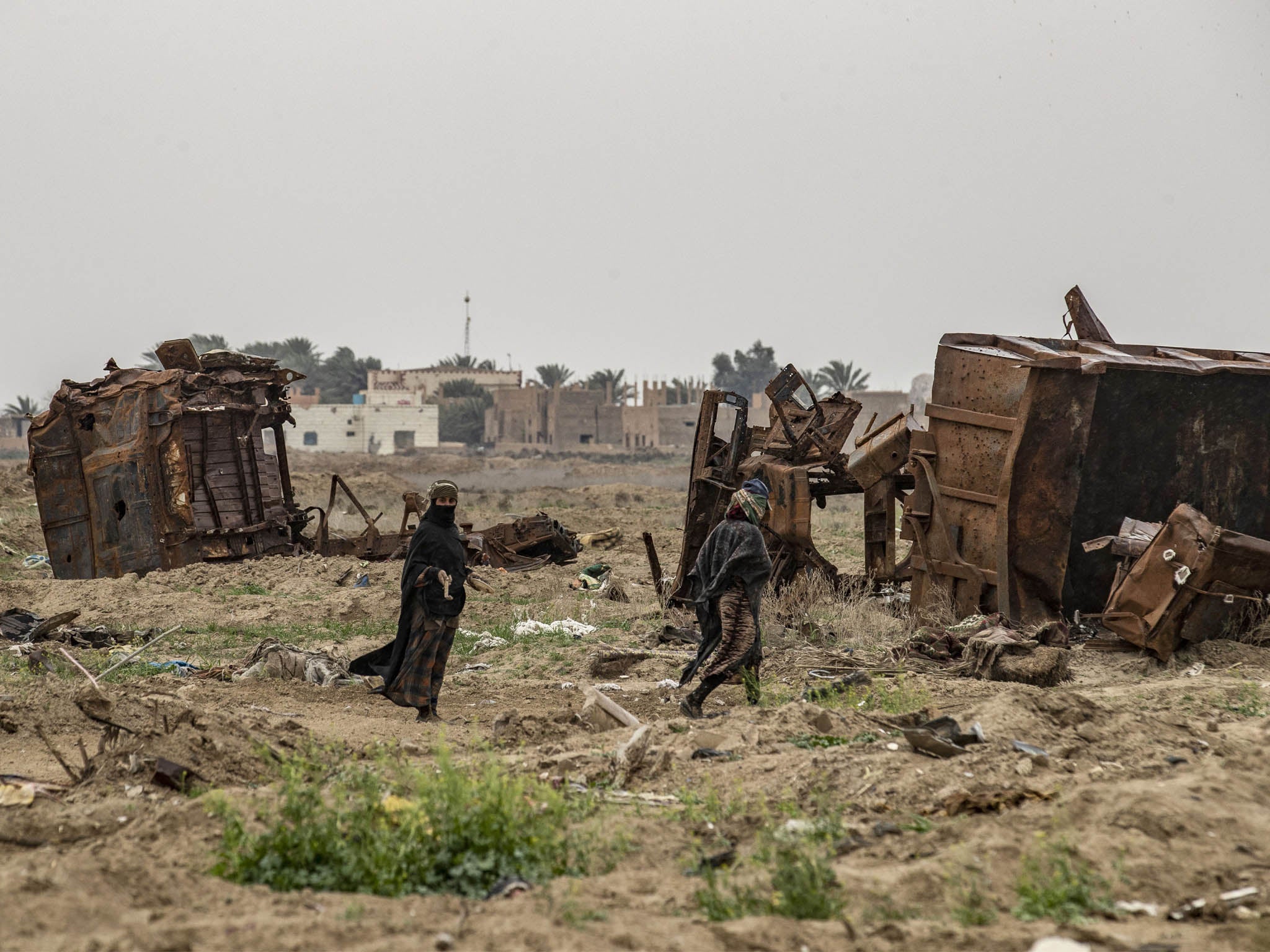 Damaged land in the eastern Syrian village of Baghouz on March 13, 2020, a year after the fall of the Islamic State’s caliphate, the subject of the popular podcast