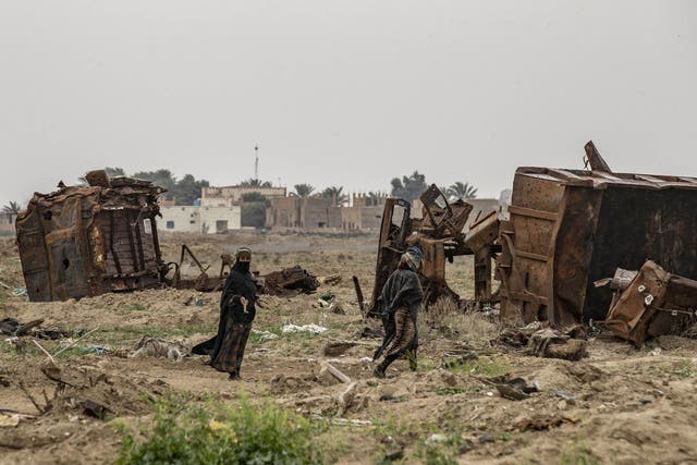 Damaged land in the eastern Syrian village of Baghouz on March 13, 2020, a year after the fall of the Islamic State’s caliphate, the subject of the popular podcast 