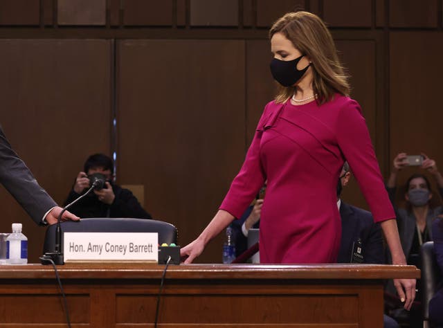 Amy Coney Barrett arrives for her confirmation hearing before the Senate Judiciary Committee on Monday