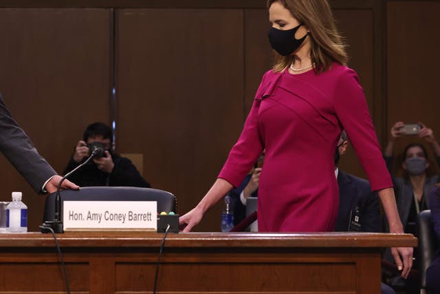Amy Coney Barrett arrives for her confirmation hearing before the Senate Judiciary Committee on Monday