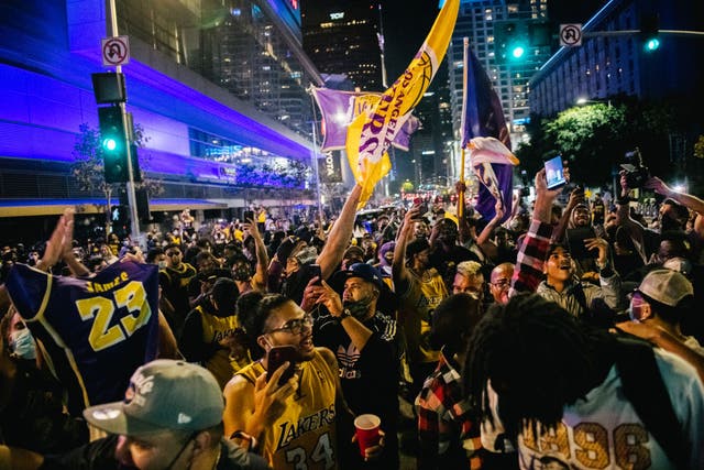 Elated Lakers fans flood the streets  following win