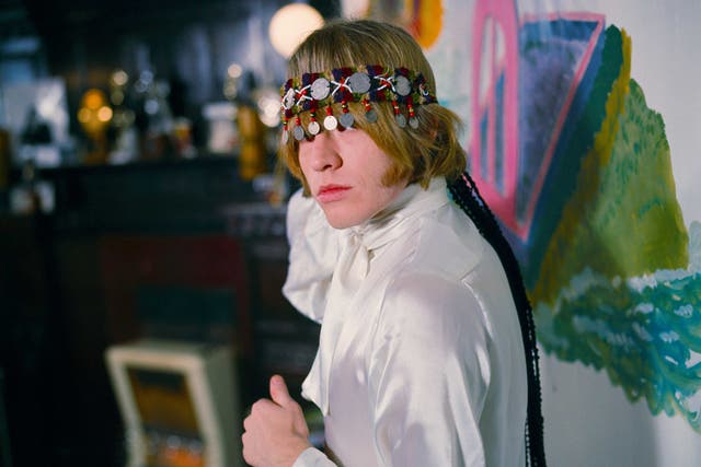 <p>Brian Jones at home with north African headress. Courtfield Gardens, South Kensington</p>