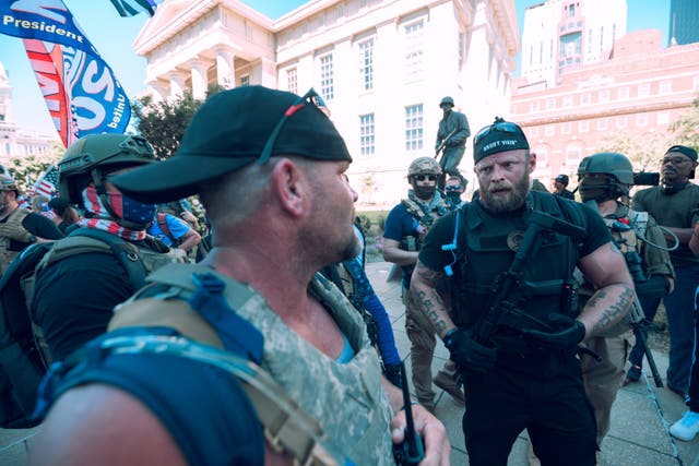 Far-right groups such as the Angry Vikings (pictured in Kentucky on September 5) are planning to patrol polling sites on Election Day