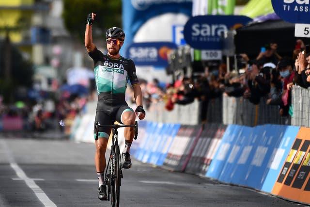 Peter Sagan celebrates as he crosses the line to win stage 10