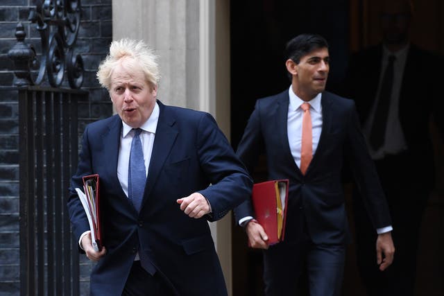 Boris Johnson departs 10 Downing Street with Cchancellor Rishi Sunak ahead of a cabinet meeting
