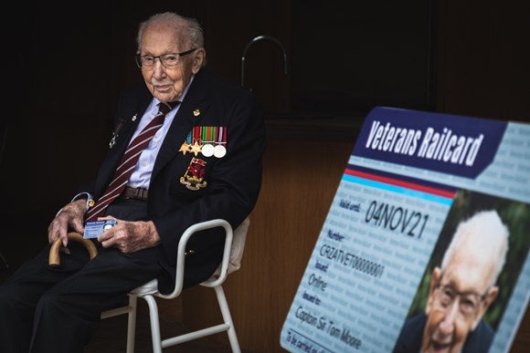 Honoured traveller: Captain Sir Tom Moore is the first recipient of the Veterans Railcard