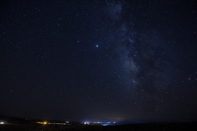 Stars and the Milky Way are seen on the Navajo Nation in Hidden Springs, Arizona
