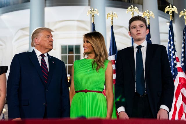 <p>Barron Trump right, stands with President Donald Trump and  first lady Melania Trump on the South Lawn of the White House on the fourth day of the Republican National Convention in Washington. (AP Photo/Evan Vucci)</p>