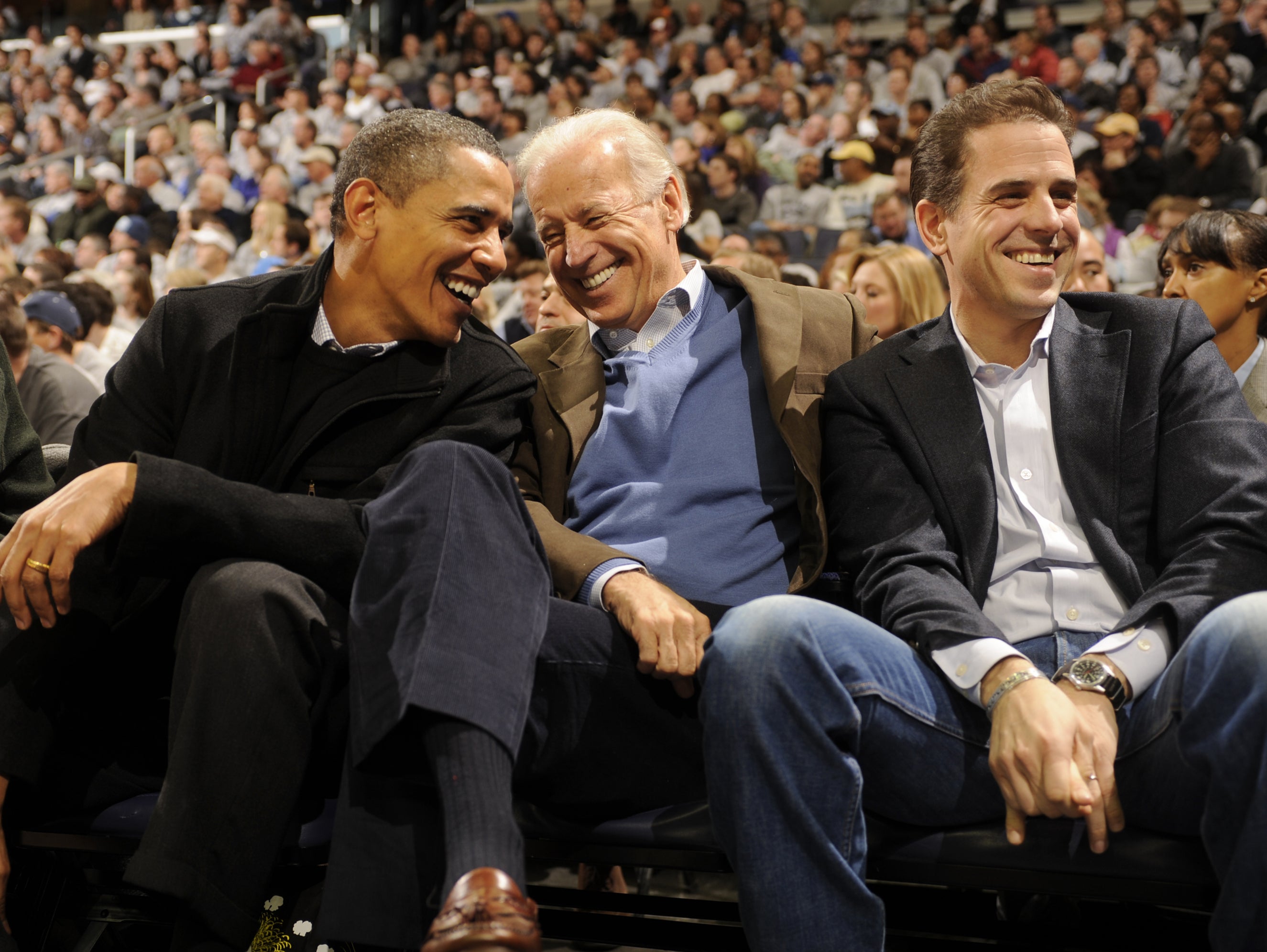 Joe Biden, pictured with Barack Obama and his son, Hunter, also denies the claims