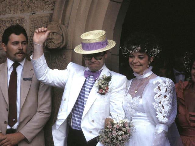 John and Blauel on their wedding day in 1984