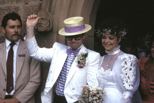 John and Blauel on their wedding day in 1984