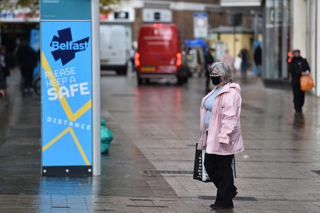Shoppers in Belfast city centre wearing face masks