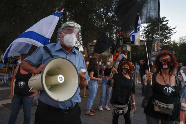 Israeli protesters gather for a demonstration against Prime Minister Benjamin Netanyahu’s government in Jerusalem
