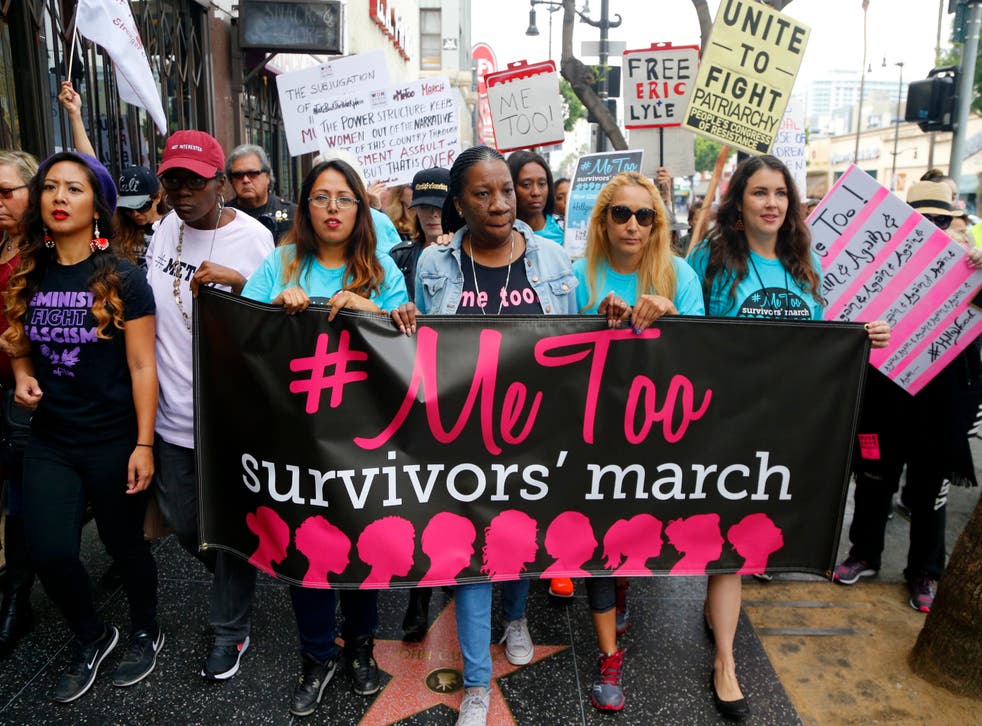 <p>Tarana Burke, founder and leader of the MeToo movement, marches with others at a rally in Hollywood </p>