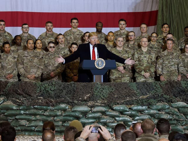 Donald Trump addresses troops during a surprise visit to Afghanistan in 2019