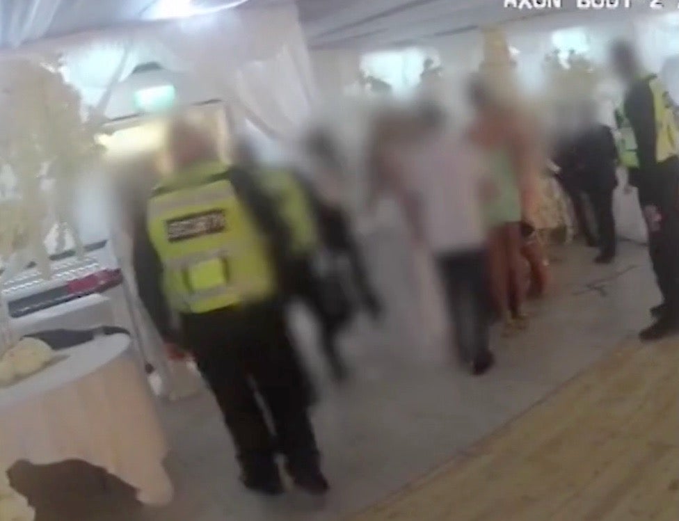 Footage from body-worn cameras released by the Met Police showed guests at the west London wedding