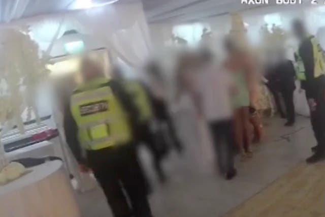 Footage from body-worn cameras released by the Met Police showed guests at the west London wedding