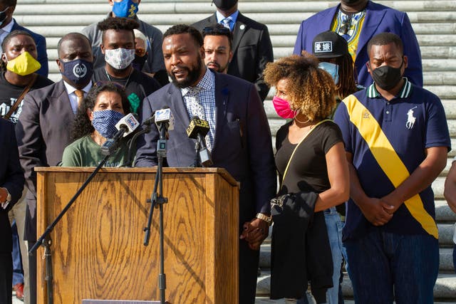 Attorney Lee Merritt speaks at a news conference along with the family of Ronald Greene and others outside the Louisiana State Capitol in Baton Rouge