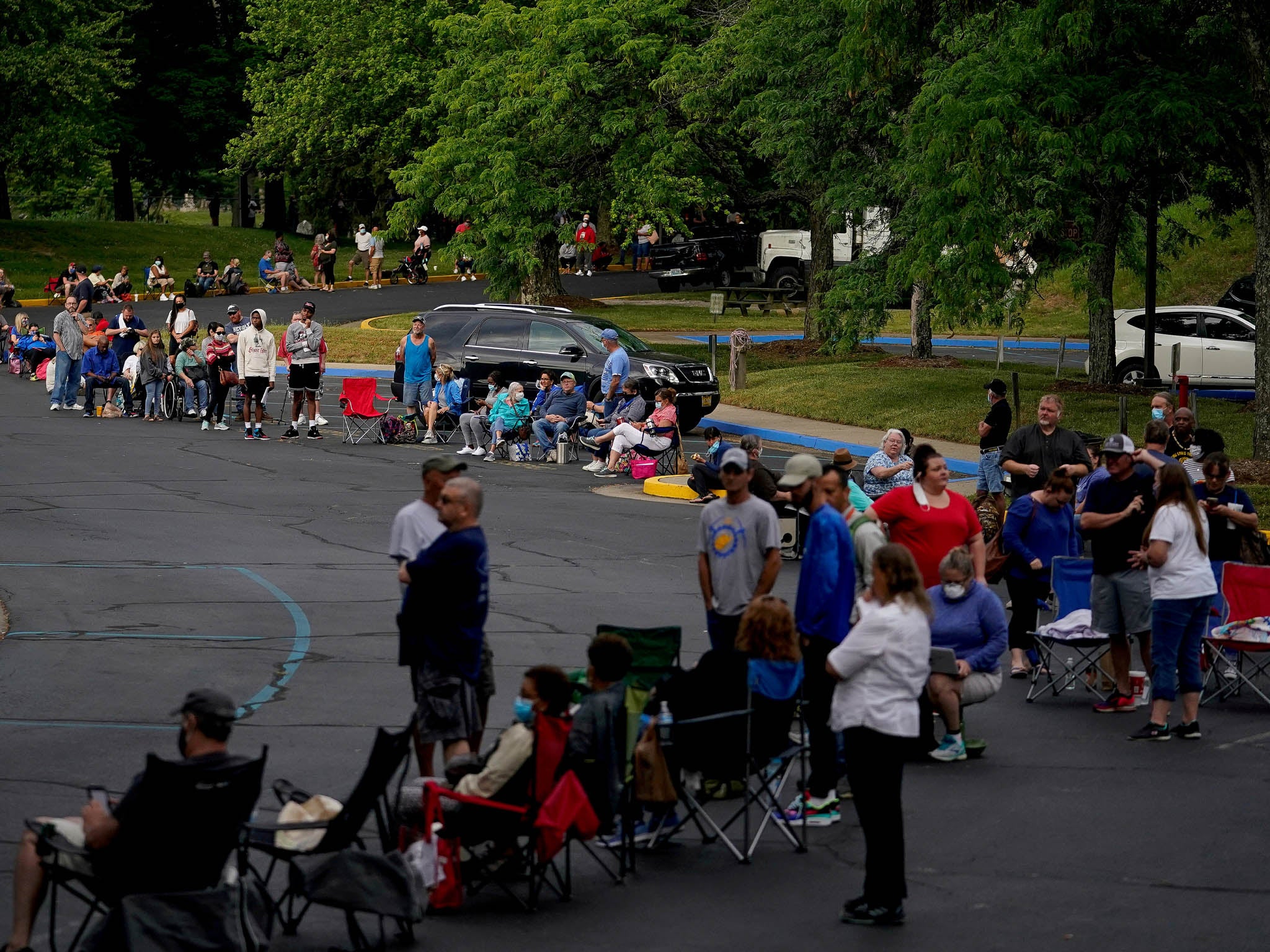 People lining up outside Kentucky Career Centre prior to register unemployment claims in Kentucky, June 2020