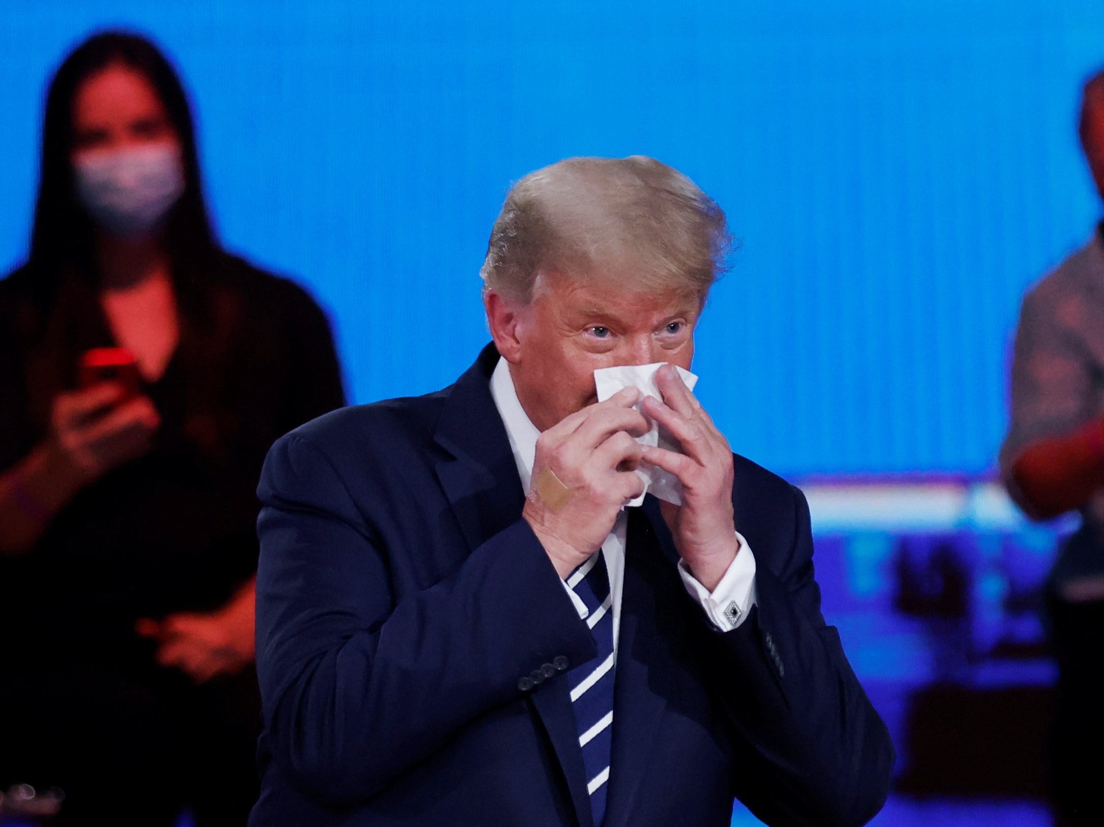 Trump shares joke article about Twitter blocking negative Biden news