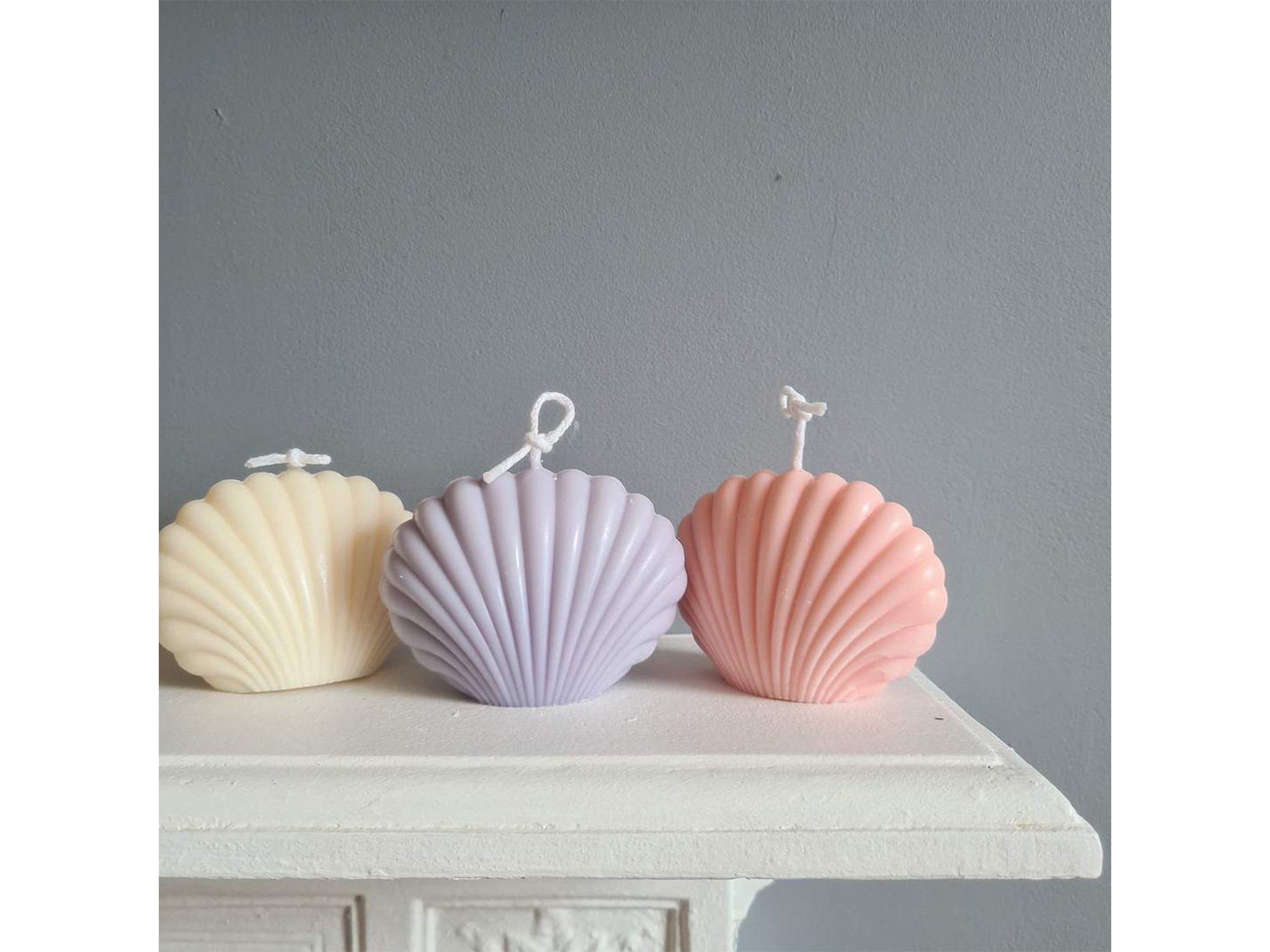 Brighten up a mantel piece with these pastel candles