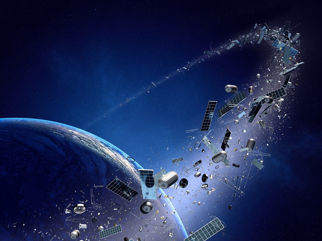 <p>File image: Space junk is becoming an increasing problem as more and more objects are sent into low-Earth orbit</p>