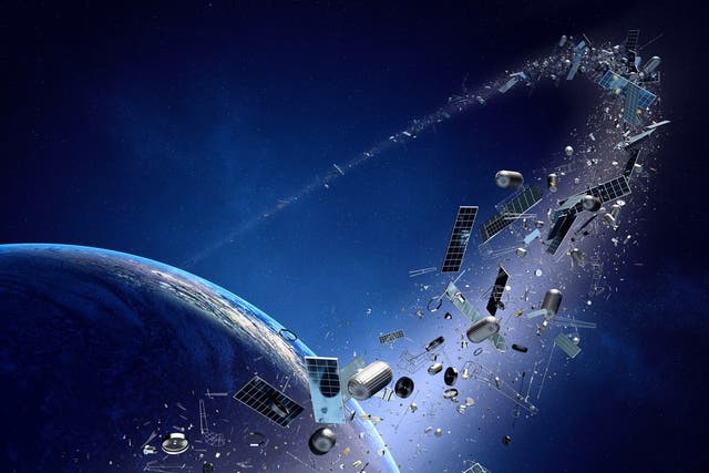 <p>File image: Space junk is becoming an increasing problem as more and more objects are sent into low-Earth orbit</p>