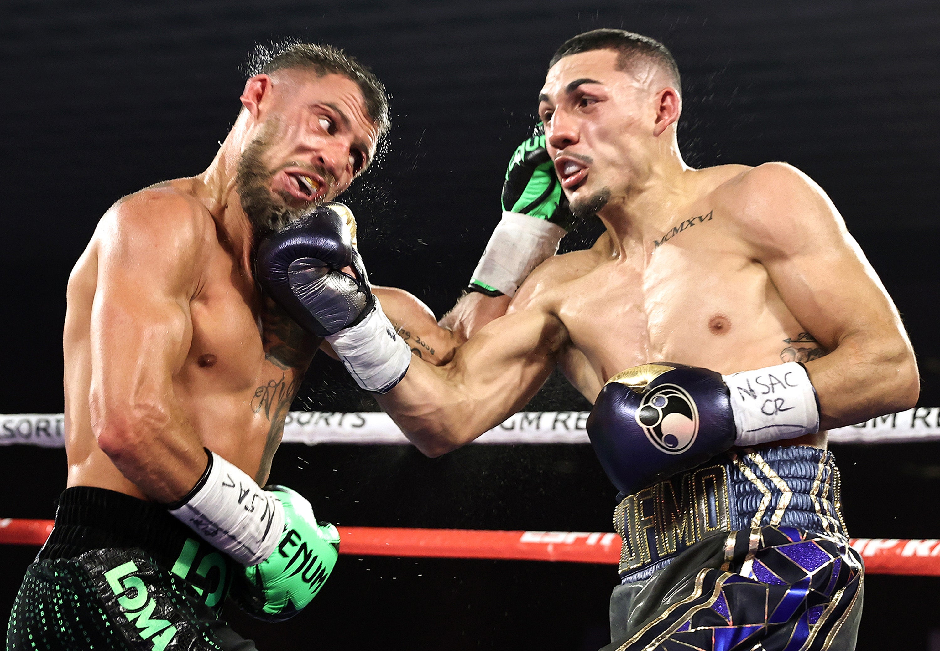 Teofimo Lopez, right, got the better of Vasiliy Lomachenko