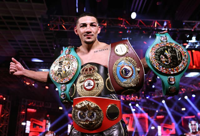 Teofimo Lopez celebrates after unifying the decision