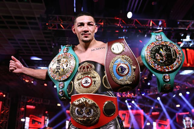 Teofimo Lopez celebrates after unifying the decision