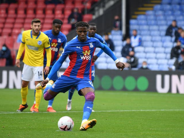 Cystal Palace striker Wilfried Zaha scores from the spot against Brighton at the weekend