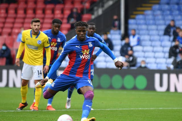 Cystal Palace striker Wilfried Zaha scores from the spot against Brighton at the weekend