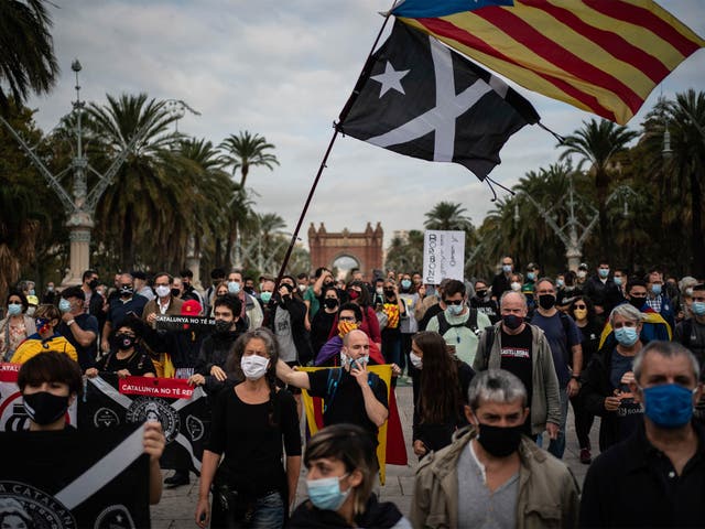 Catalan separatist demonstrators during a protest in Barcelona on 9 October against the visit of Spanish King Felipe VI and Prime Minister Pedro Sanchez