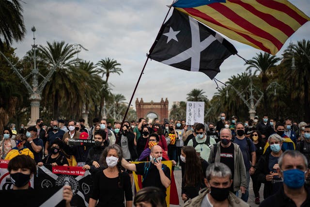 Catalan separatist demonstrators during a protest in Barcelona on 9 October against the visit of Spanish King Felipe VI and Prime Minister Pedro Sanchez