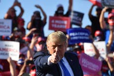 Trump rages at coronavirus coverage during crowded rally