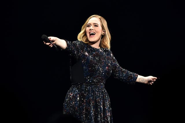 Adele performing live in 2016