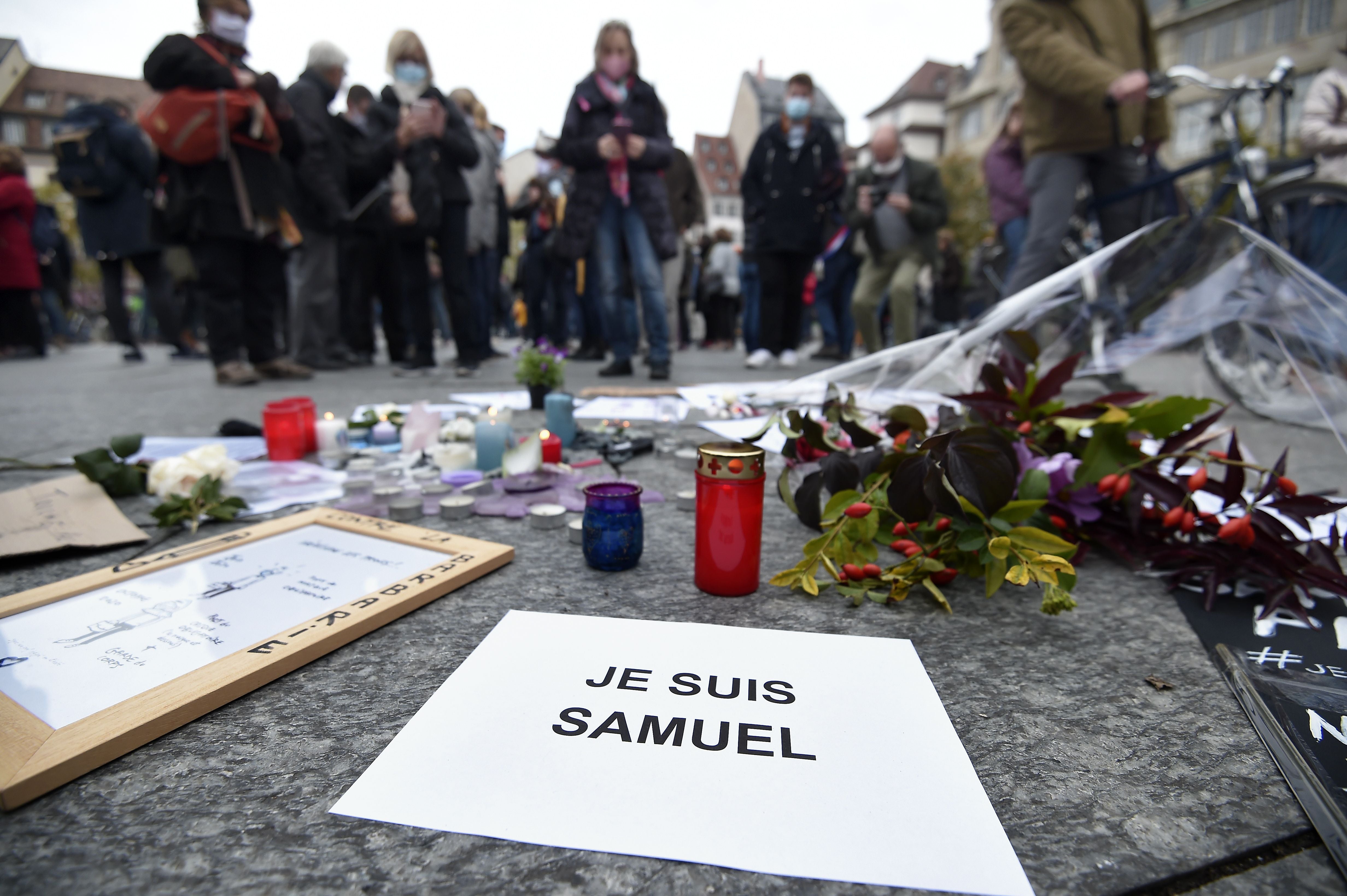 People gathered at the weekend to pay homage to Samuel Paty after he was beheaded outside his school