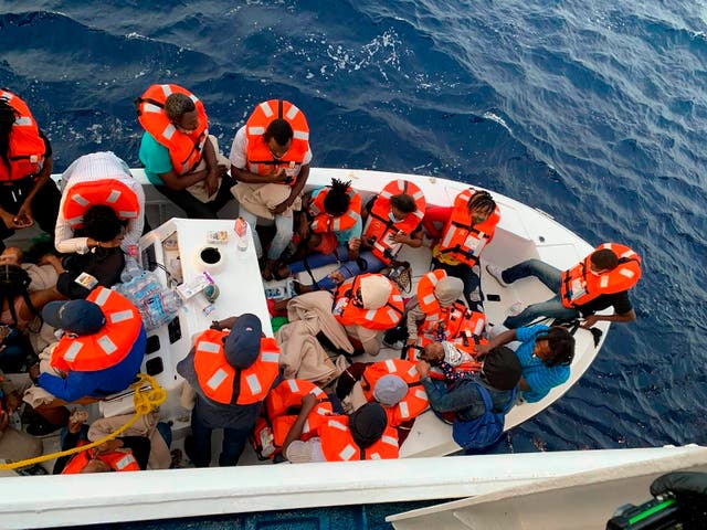 This photo provided by Carnival Cruise Line shows people after being rescued by a Carnival Cruise Line ship off the Florida coast, the cruise line reported on Saturday 17 October 2020