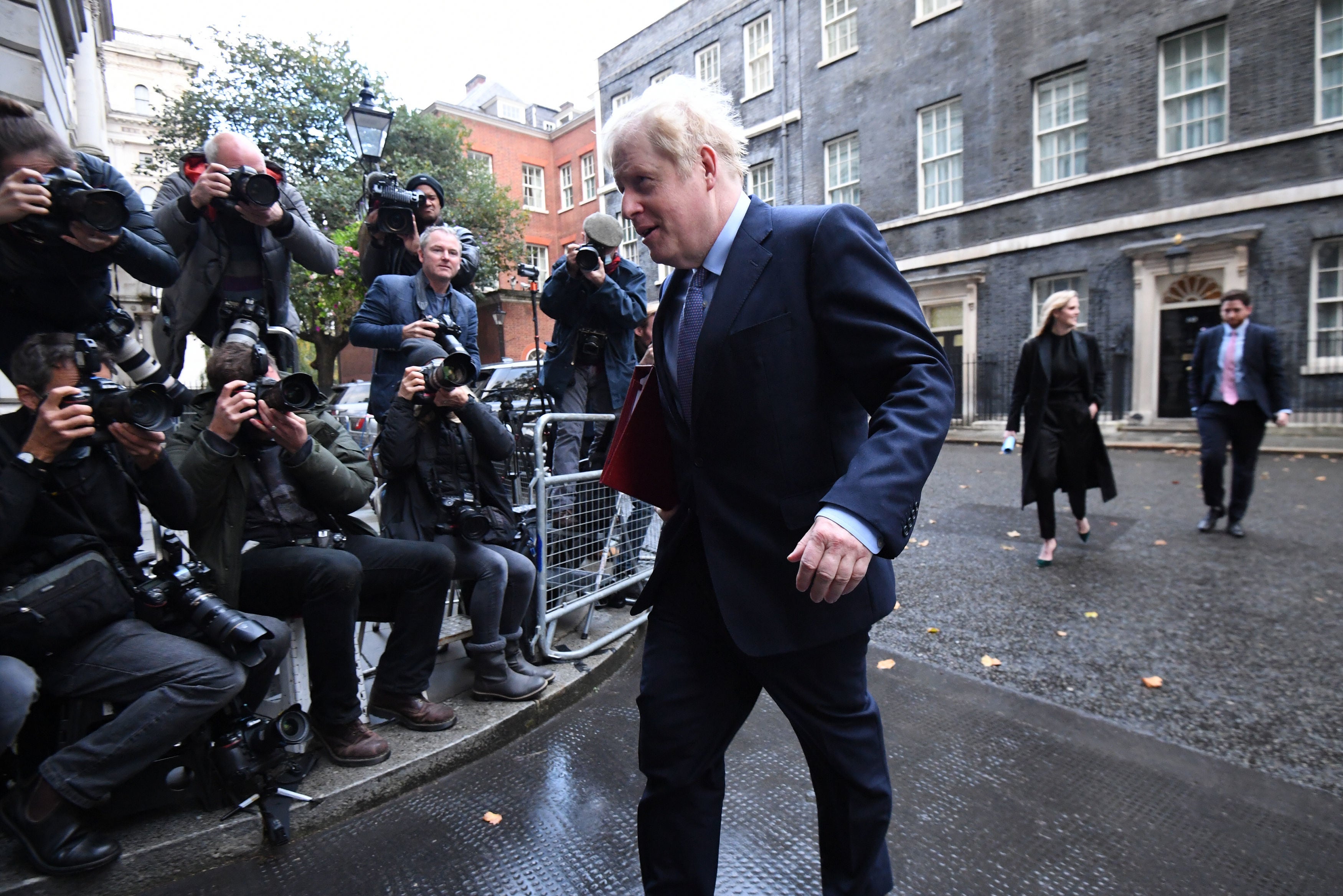 Boris Johnson is facing the threat of a further revolt from backbenchers ahead of his expected three-tier plans set to be announced tomorrow.