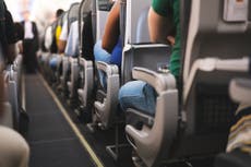 Woman who died on commercial flight had coronavirus, officials rule
