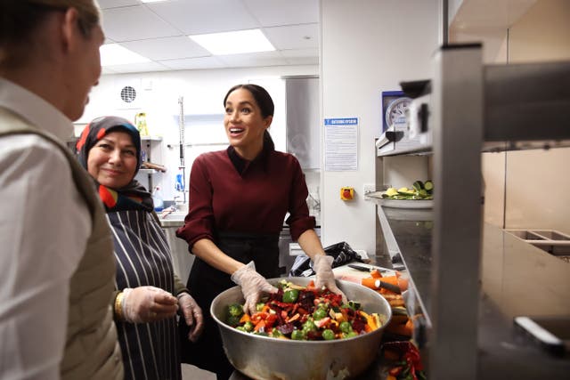 The real deal: Meghan visiting the Hubb Community Kitchen, frequented by Grenfell fire survivors